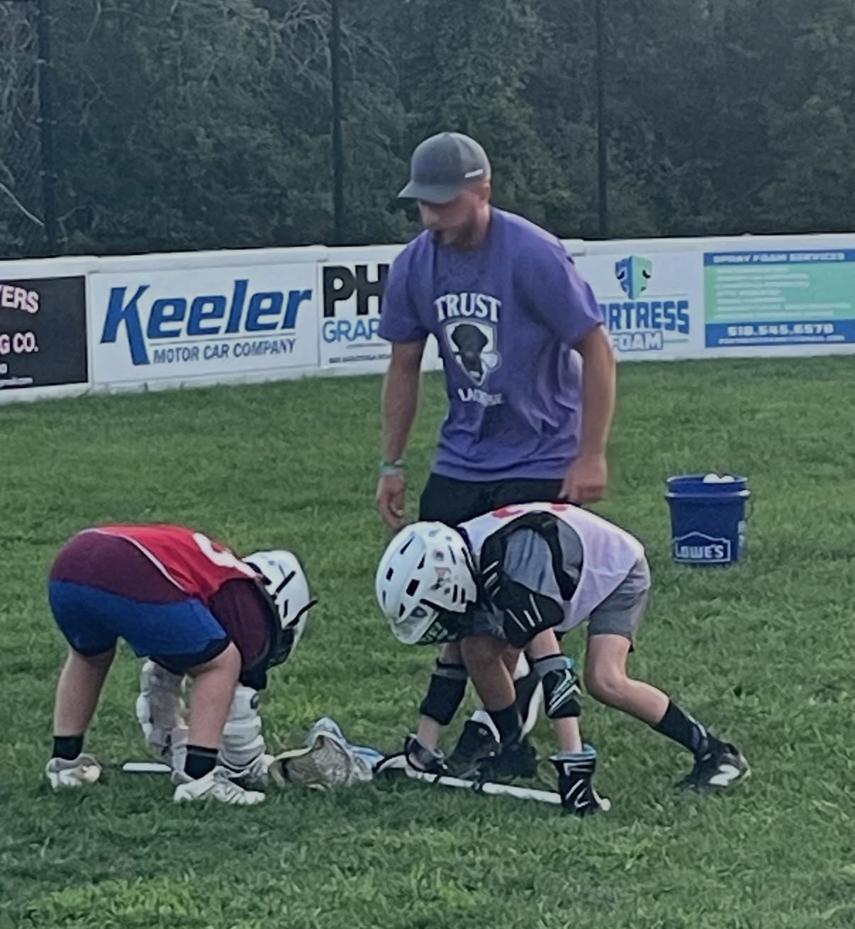 Faceoff instruction at a Trust Lacrosse camp