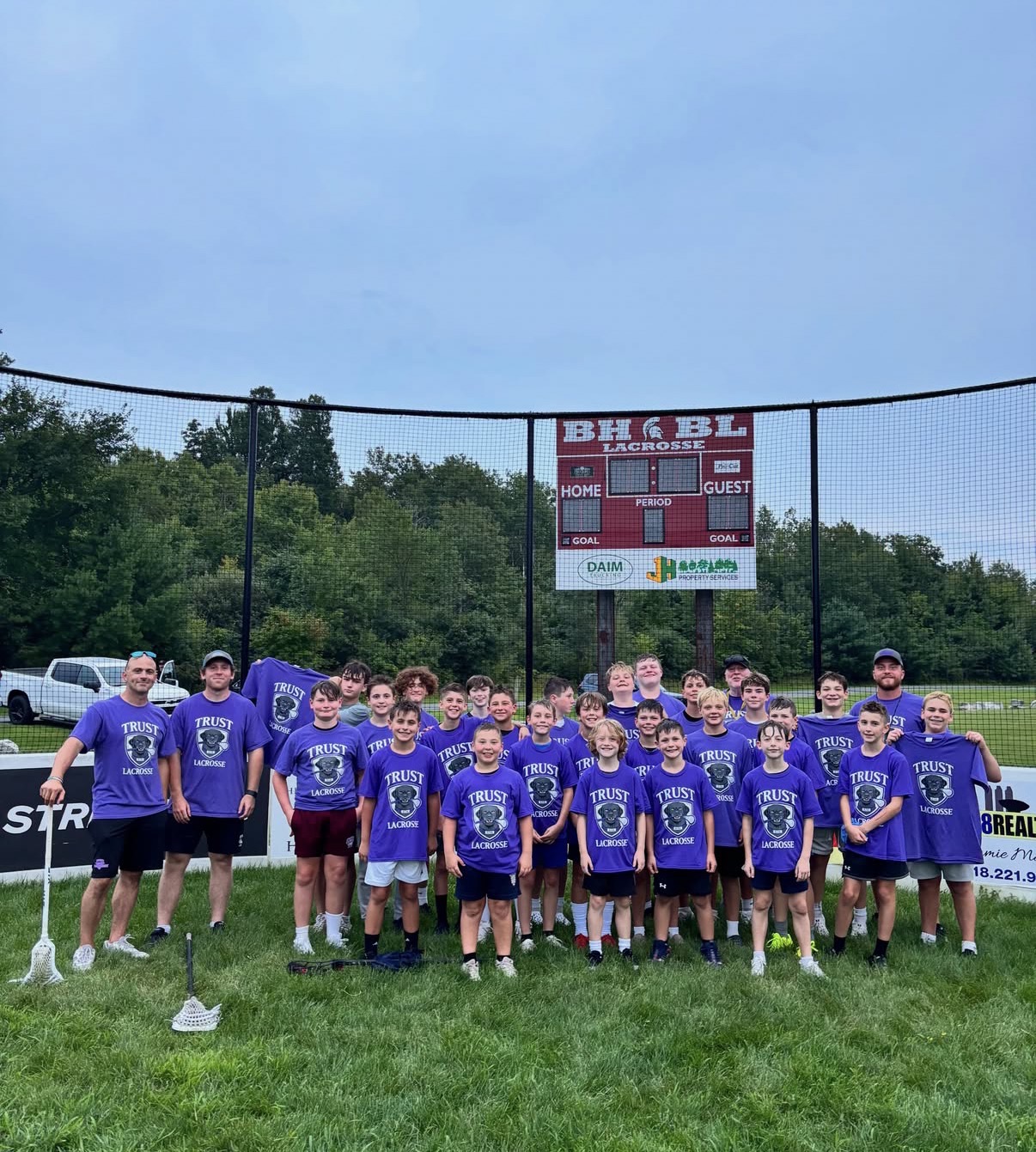 Trust Lacrosse players and coaches at summer camp